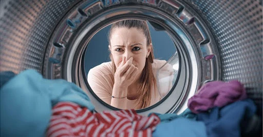 Máy sấy quần áo có mùi khét nguyên nhân do đâu?